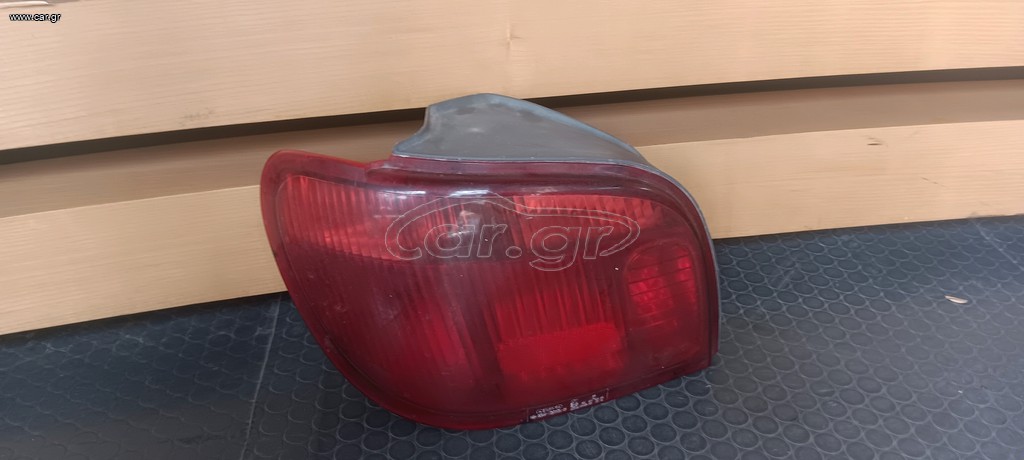 TOYOTA YARIS 03-05 ΟΠΙΣΘΙΟ ΑΡΙΣΤΕΡΟ ΦΑΝΑΡΙ (ΜΕ ΝΤΟΥΙ)