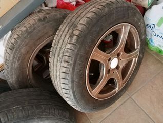 Ζάντες Αλουμινίου 14'' 4x100 (3+1) από mazda 2 2008μαζί με Λάστιχα 4-5ετίας Kleber 175/65 R14