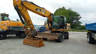 Εκσκαφέας Με Λάστιχα CAT 2014 M 322 D