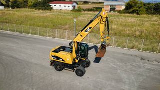 Εκσκαφέας Με Λάστιχα CAT 2014 M 322 D-thumb-6