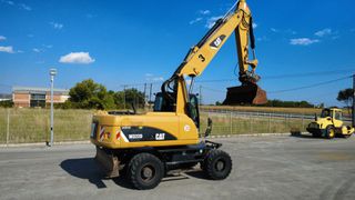 Εκσκαφέας Με Λάστιχα CAT 2014 M 322 D