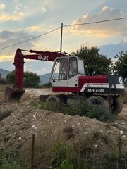 Εκσκαφέας Με Λάστιχα O & K 1995 MH plus