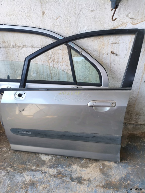 Honda Jazz 2003-2008 πόρτα εμπρός αριστερή (οδηγού) ,τύπος με αυτοκολλητη φάσα