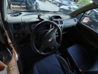 Suzuki Wagon R+ 2004-thumb-5