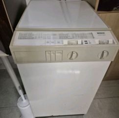Πλυντήριο ρούχων BOSCH WOH1000, άνω φόρτωσης.