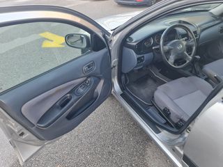 Nissan Almera 2004-thumb-8