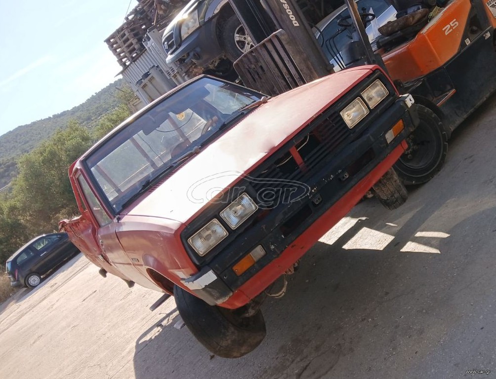 MITSUBISHI L200 1.6cc BENZINH