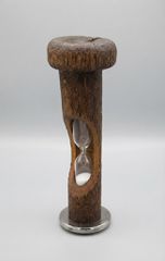 An hourglass within a wooden thread spool.-thumb-2