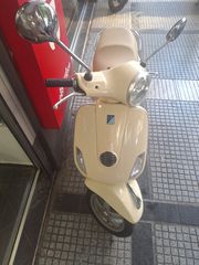 Piaggio Vespa LX 150 2011-thumb-15