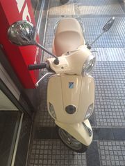 Piaggio Vespa LX 150 2011-thumb-16