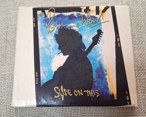 Ronnie Wood – Slide On This CD