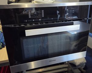 Miele H6200BM (A 24-inch space-saving speed oven combining classic fan baking with a microwave