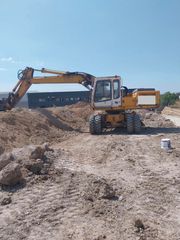 Εκσκαφέας Με Λάστιχα Liebherr 1993 Α 912 litronic