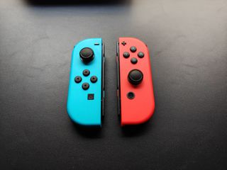 Nintendo Switch OLED 64GB +Hogwarts Legacy-thumb-5