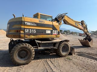 Εκσκαφέας Με Λάστιχα CAT 2000 215