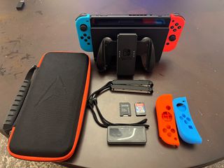 Nintendo switch με δώρο κάρτα μνήμης και παιχνίδι +όλο το πακετο