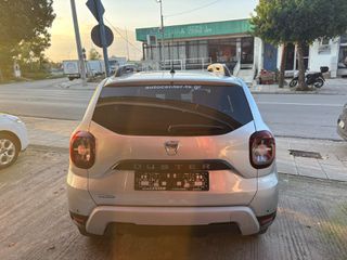 Dacia Duster 2021 1.5 dCi 116Ps 4x2 SL 15 Ans !!-thumb-3
