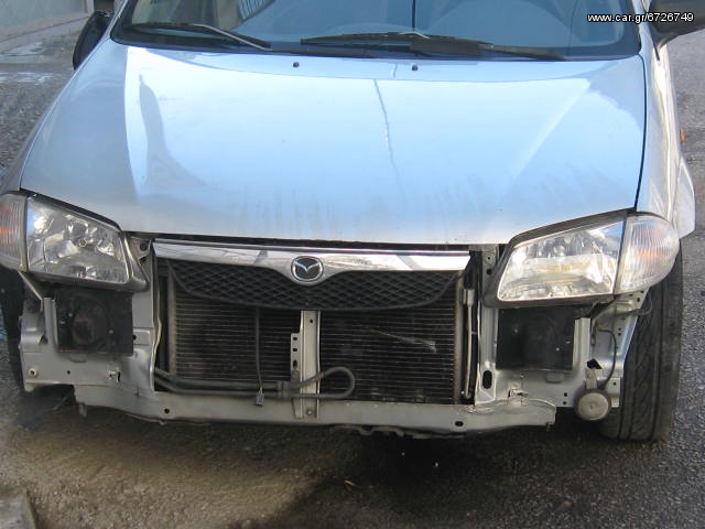 Mazda 323  '01