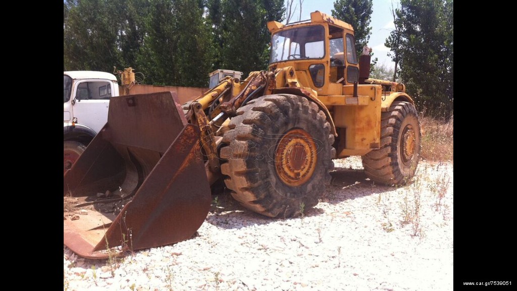 Φορτωτής Με Λάστιχα CAT 1975 988 A
